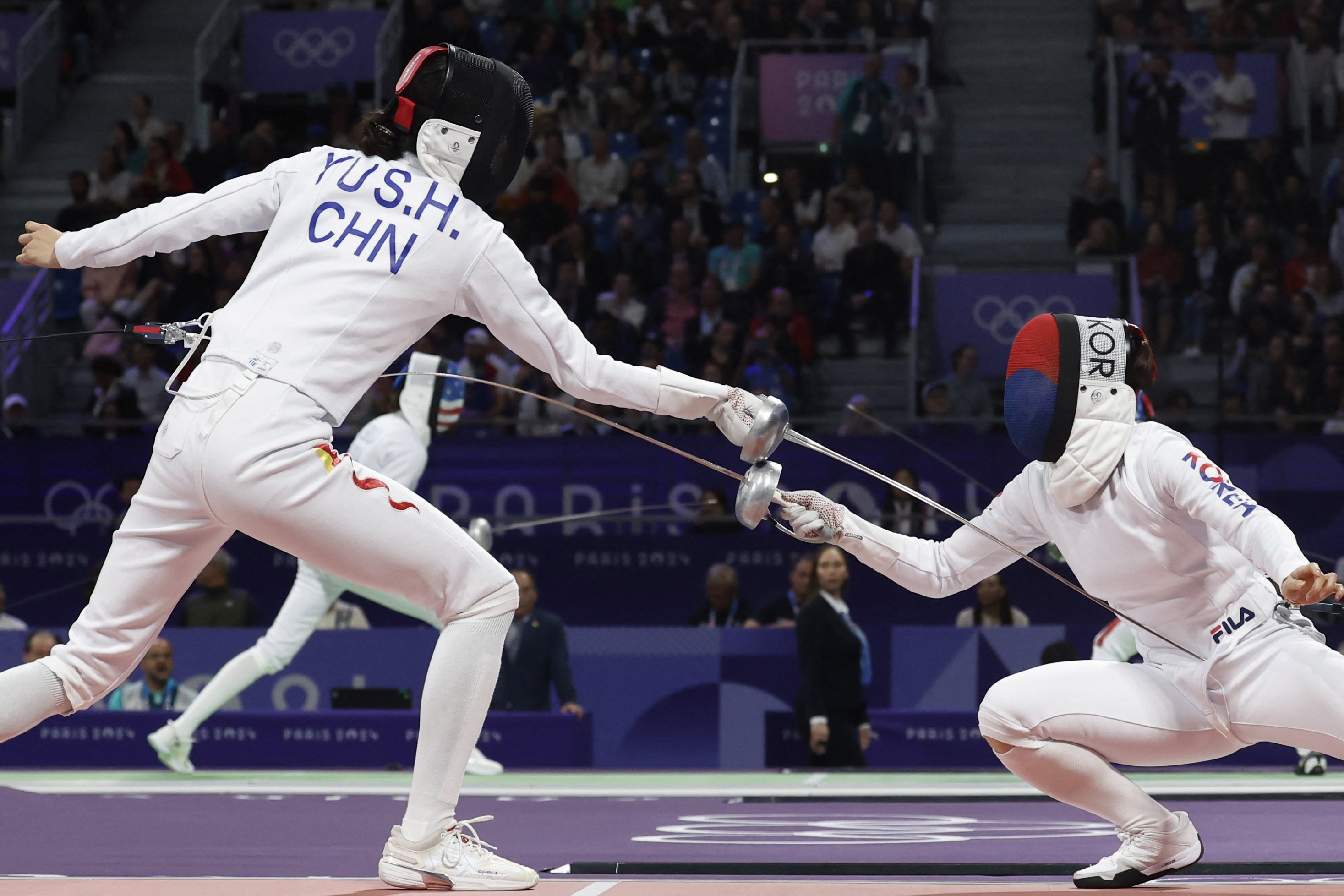 爱游戏体育官网-韩国选手击败对手，夺取击剑比赛冠军